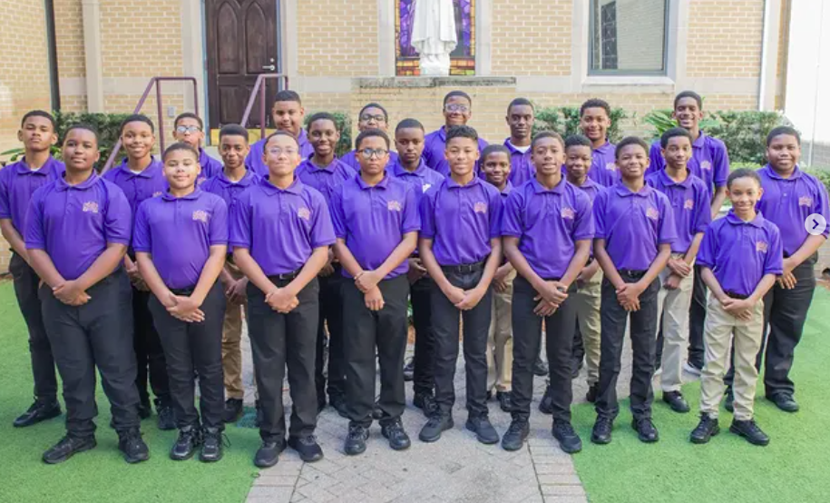 Young Purple Knights gathered at St. Augustine